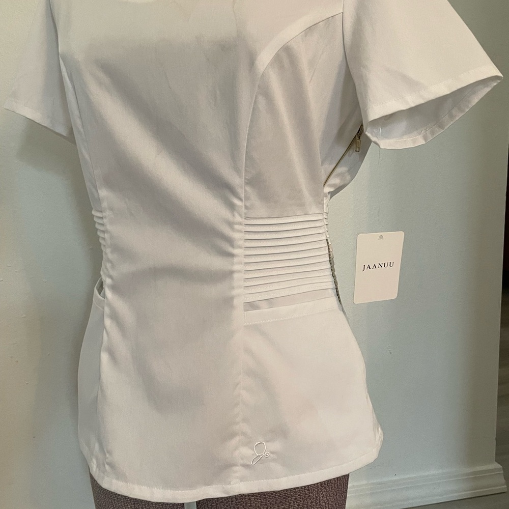 Jaanuu White Scrub Top with Slimming Pleats and Gold Side Zipper - Picture 4 of 11